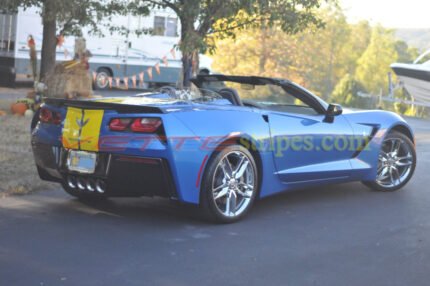 Laguna blue C7 Corvette Stingray convertible with yellow GM full length racing stripes