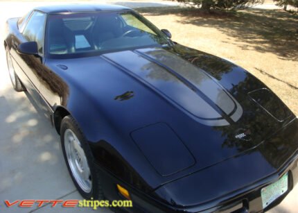 Black C4 Corvette with metallic dark charcoal CE stripes