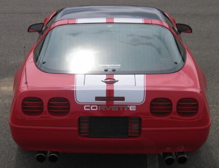 Red C4 Corvette coupe with metallic silver CE1 stripe