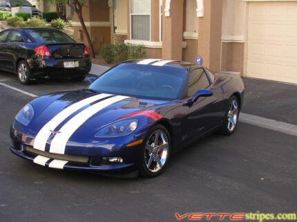 Lemans blue C6 corvette coupe with white dual racing stripes