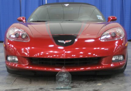 Mag red C6 Corvette with metallic black and metallic dark charcoal ME stripe