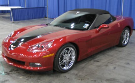 Mag red C6 Corvette with metallic black and metallic dark charcoal ME stripe