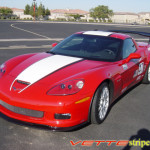 Red C6 Corvette Z06 Grand Sport with white and matte black ME stripe