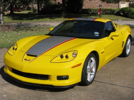 Yellow C6 Corvette Z06 Grand Sport with silver and red ME stripe