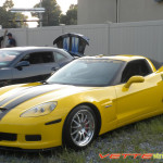 yellow C6 Corvette Z06 with black racing 2 stripe
