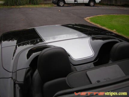 C6 Corvette black convertible with metallic silver stripe