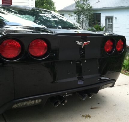 Black C6 Corvette with matte black racing stripe 2