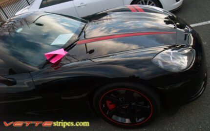 Black C6 Corvette with red hood stripe 5