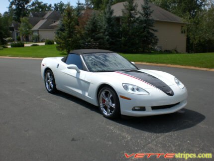 Arctic white C6 Corvette convertible with black and red ME stripes