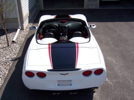 Arctic white C6 Corvette convertible with black and red ME stripes