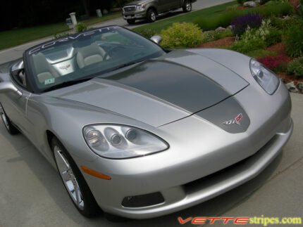 Machine silver C6 Corvette convertible with medium charcoal and charcoal ME stripes