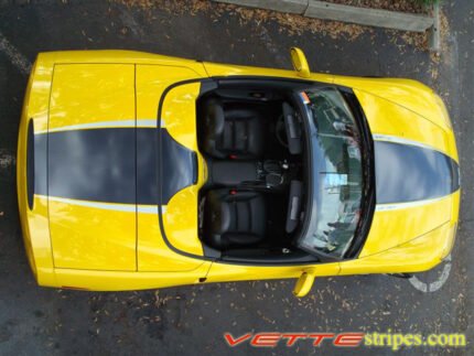 Yellow C6 Corvette convertible with black carbon fiber and silver ME stripe