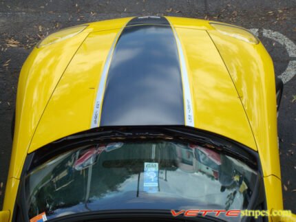 Yellow C6 Corvette convertible with black carbon fiber and silver ME stripe