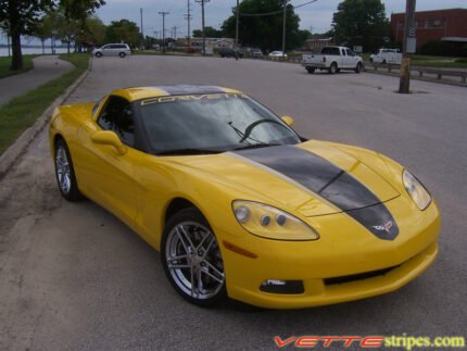 Yellow C6 Corvette coupe with black and silver ME stripe