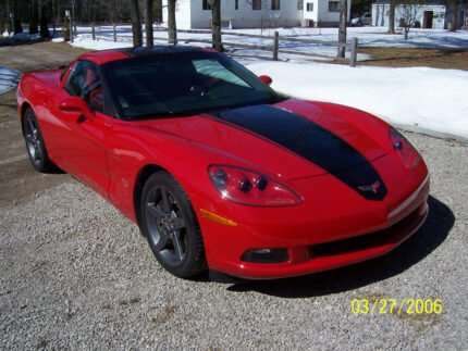 C6 Corvette with black and dark charcoal ME stripes