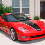 Red C6 Corvette with black and silver ME stripes