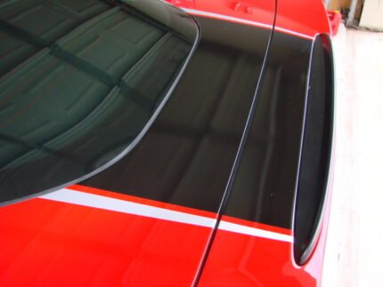 Red C6 Corvette with black and silver ME stripes