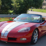 Red C6 Corvette with metallic silver GM full body racing stripe 2