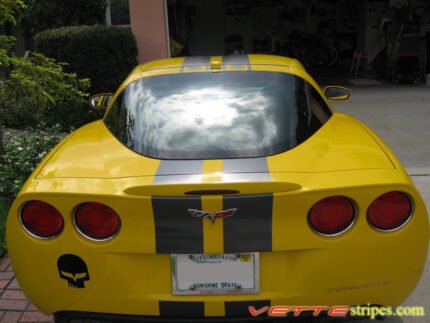 Yellow C6 Corvette with metallic dark charcoal racing stripe