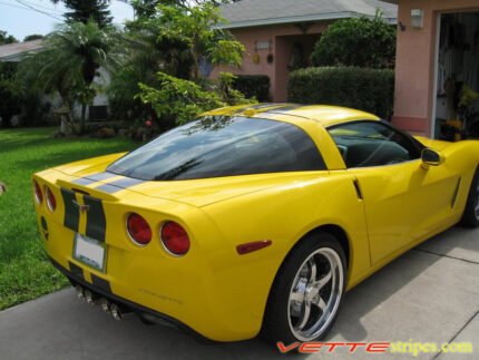 Yellow C6 Corvette with metallic dark charcoal racing stripe