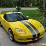 Yellow C6 Corvette with metallic dark charcoal racing stripe