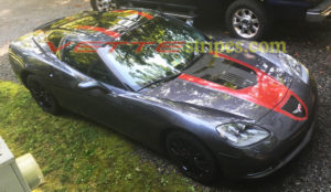 Cyber grey C6 coupe with gloss black red GT1 stripes and matte black jake skull option