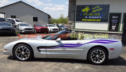 Silver C5 Corvette convertible with side stripes graphic