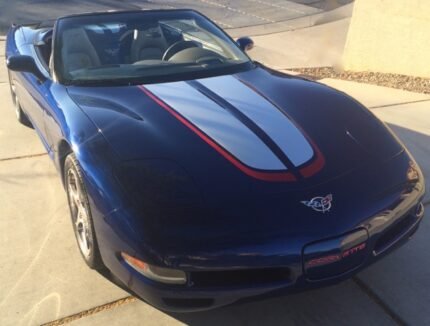 Lemans blue C5 Corvette with silver and red CE commemorative stripes