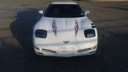 White C5 Corvette Z06 with black and red checker super hood stripes