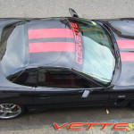 C5 Corvette black Z06 with red rally racing stripe