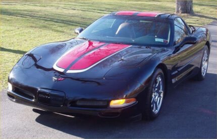 Black C5 Corvette with red and silver CE commemorative stripes