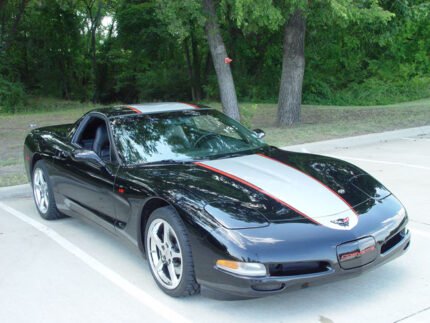 Black C5 Corvette coupe with silver and red ME stripe