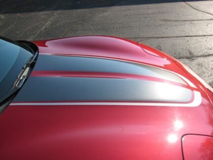 Magnetic red C5 Corvette with gunmetal and silver CE commemorative stripes