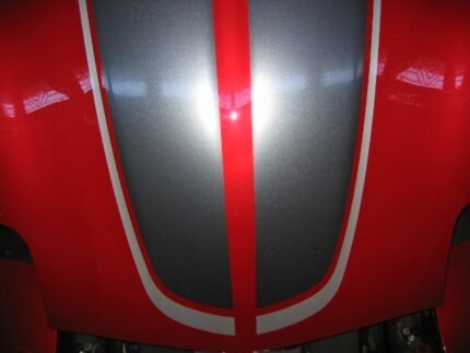 Magnetic red C5 Corvette with gunmetal and silver CE commemorative stripes