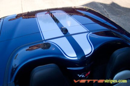 Navy blue C5 Corvette with silver CE commemorative stripes