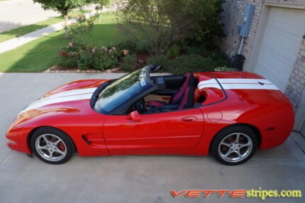 Red C5 Corvette convertible with white full body racing stripe style 3