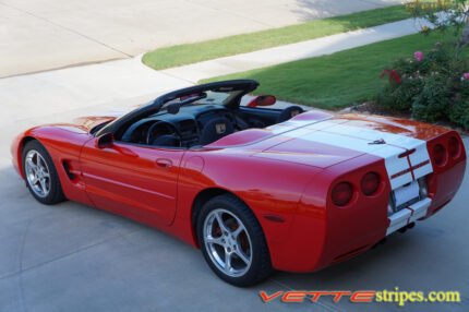 Red C5 Corvette convertible with white full body racing stripe style 3