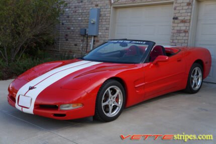 Red C5 Corvette convertible with white full body racing stripe style 3