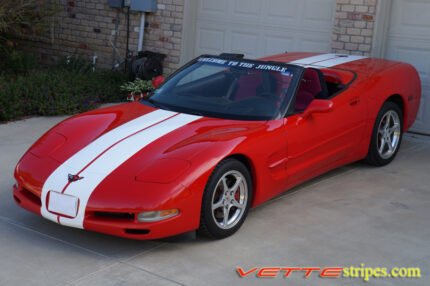 Red C5 Corvette convertible with white full body racing stripe style 3