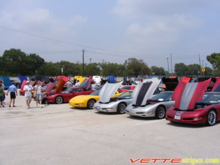 Silver C5 Corvette Z06 with black and red ME stripe