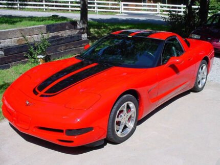 Torch red C5 Corvette with black CE commemorative stripes