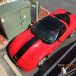 Torch red C5 Corvette with black Grand Sport stripe