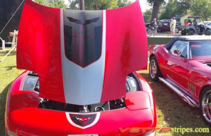 Torch red C5 Corvette with black and silver GT1 stripe and optional black carbon fiber jake skull insert