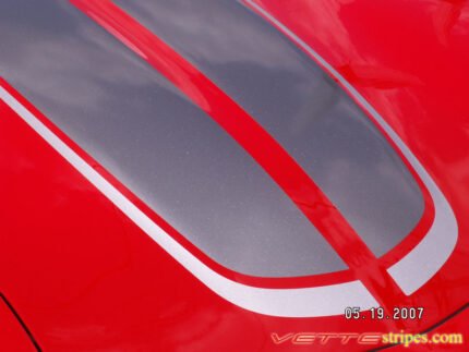 Torch red C5 Corvette with gunmetal and silver CE commemorative stripes