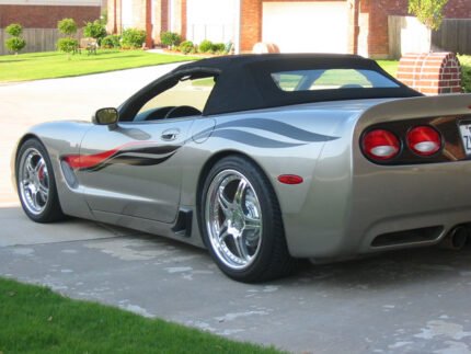 Pewter C5 Corvette with black red side stripes graphic