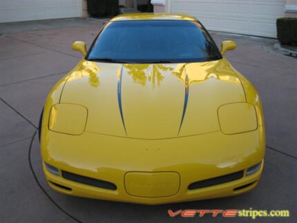 Yellow C5 Corvette with black hood spear stripe