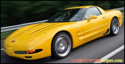 Yellow C5 Corvette with black hood spear stripe