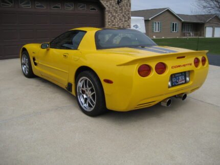 Yellow C5 Corvette with metallic black MCM hood style 2 stripe