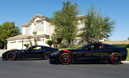 Black C7 corvette stingray with red grand sport fender hash marks