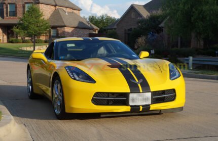 Yellow C7 Corvette stingray with matte black racing 3 stripes